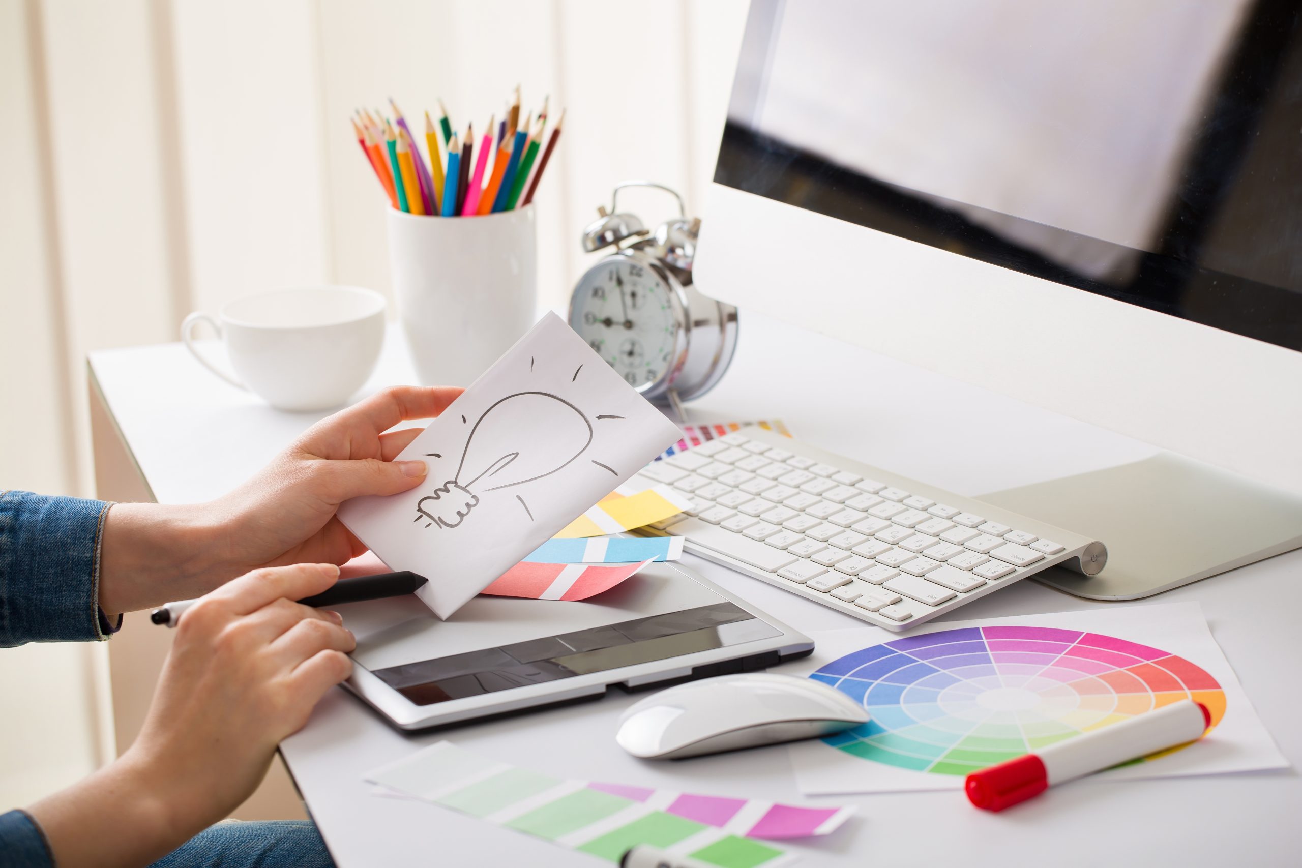 Designer hands with idea sign